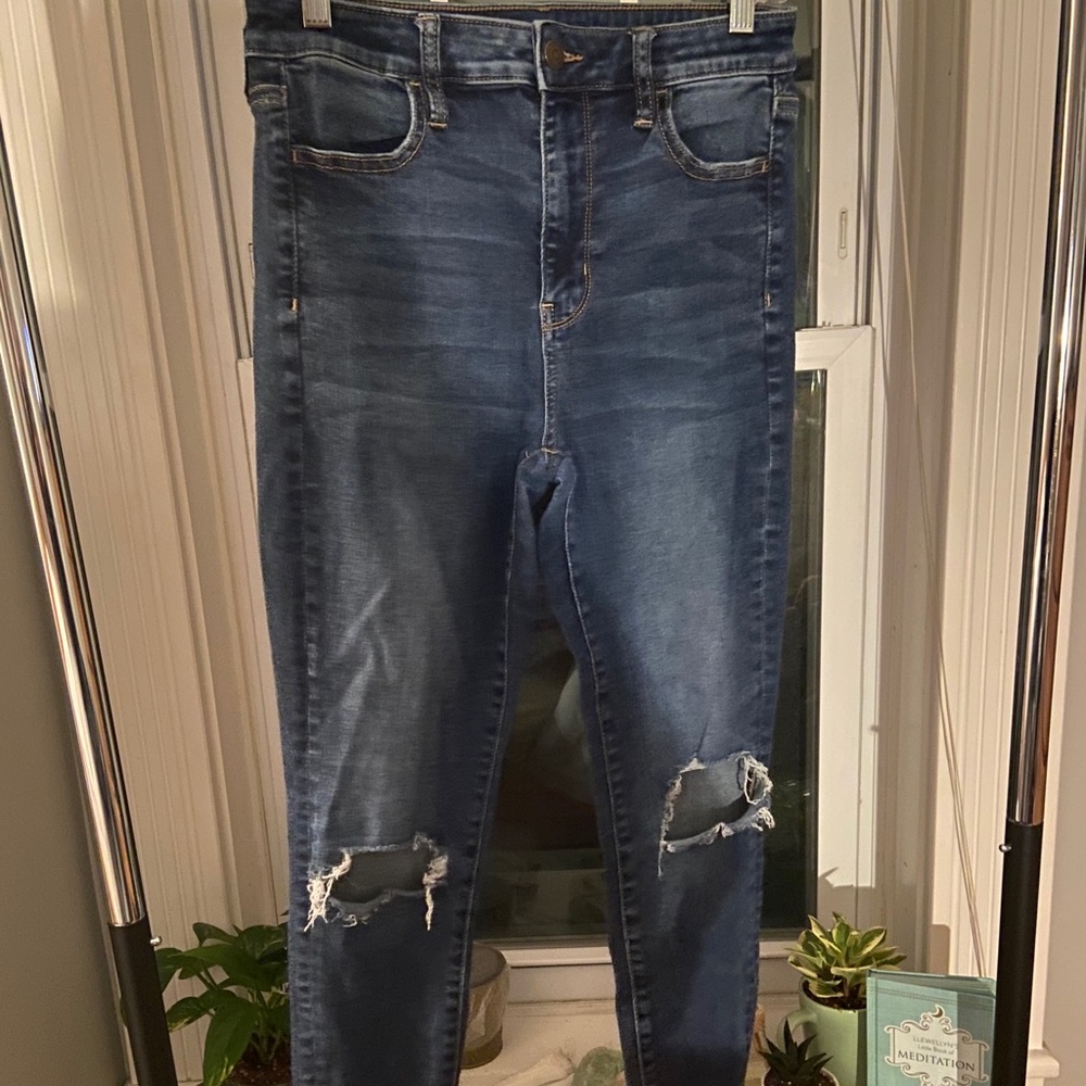 Ripped blue jeans.